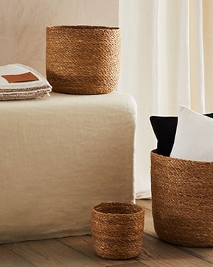 Woven baskets various sizes on fabric -living room décor